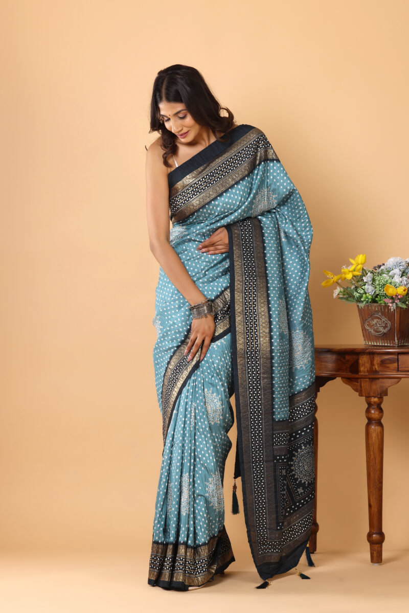 Graceful Teal Blue Dola Silk Saree with Zari Border