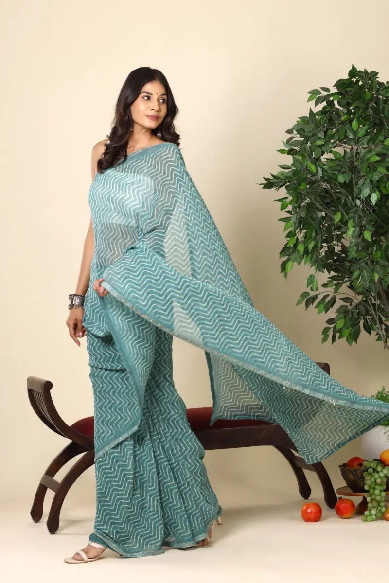 Aqua Blue Weightless Malmal Saree With Chevron Print